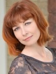 Photo of beautiful  woman Elena with red hair and green eyes - 21638